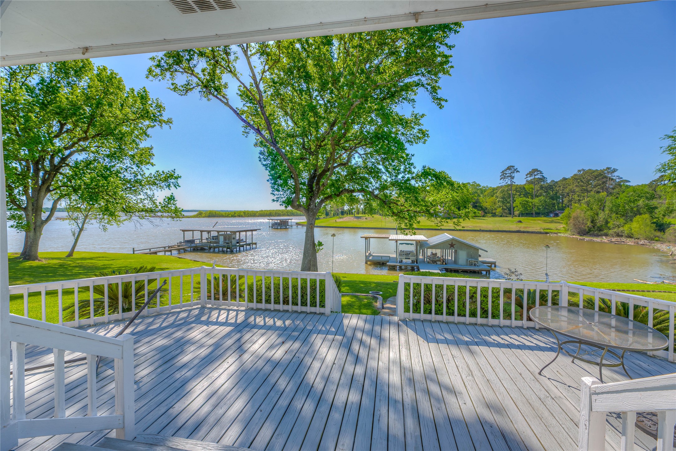 331 Memphis Belle Trinity, TX 75862 - Photo 42 of 50 a view of lake with a large garden