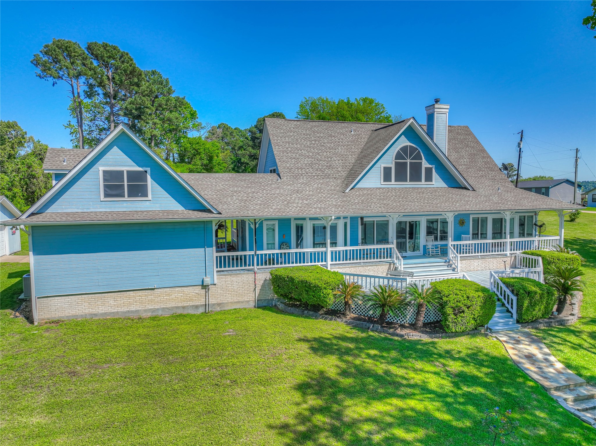 331 Memphis Belle Trinity, TX 75862 - Photo 50 of 50 a front view of a house with a yard