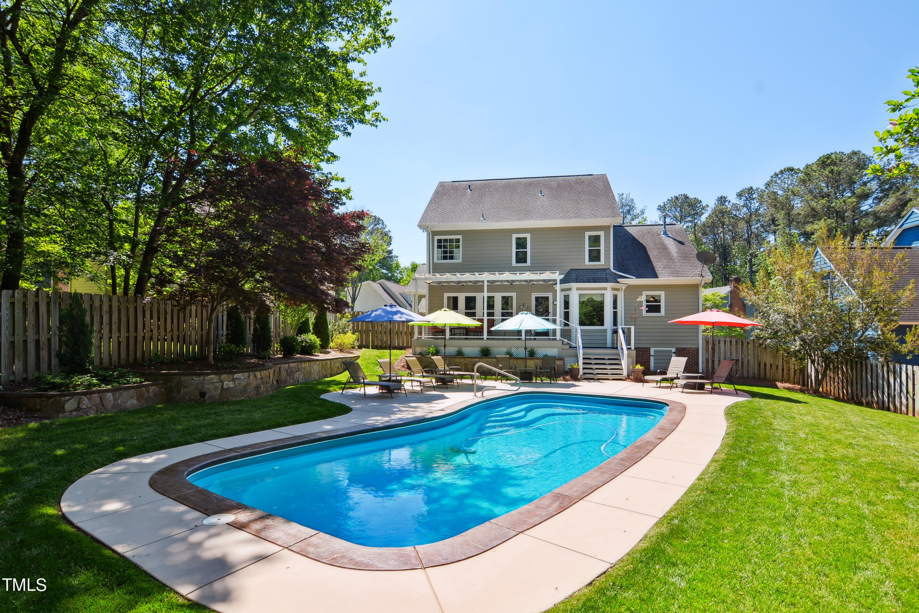 300 Foley Drive Garner, NC 27529 - Photo 1 of 29 a view of a house with swimming pool and sitting area