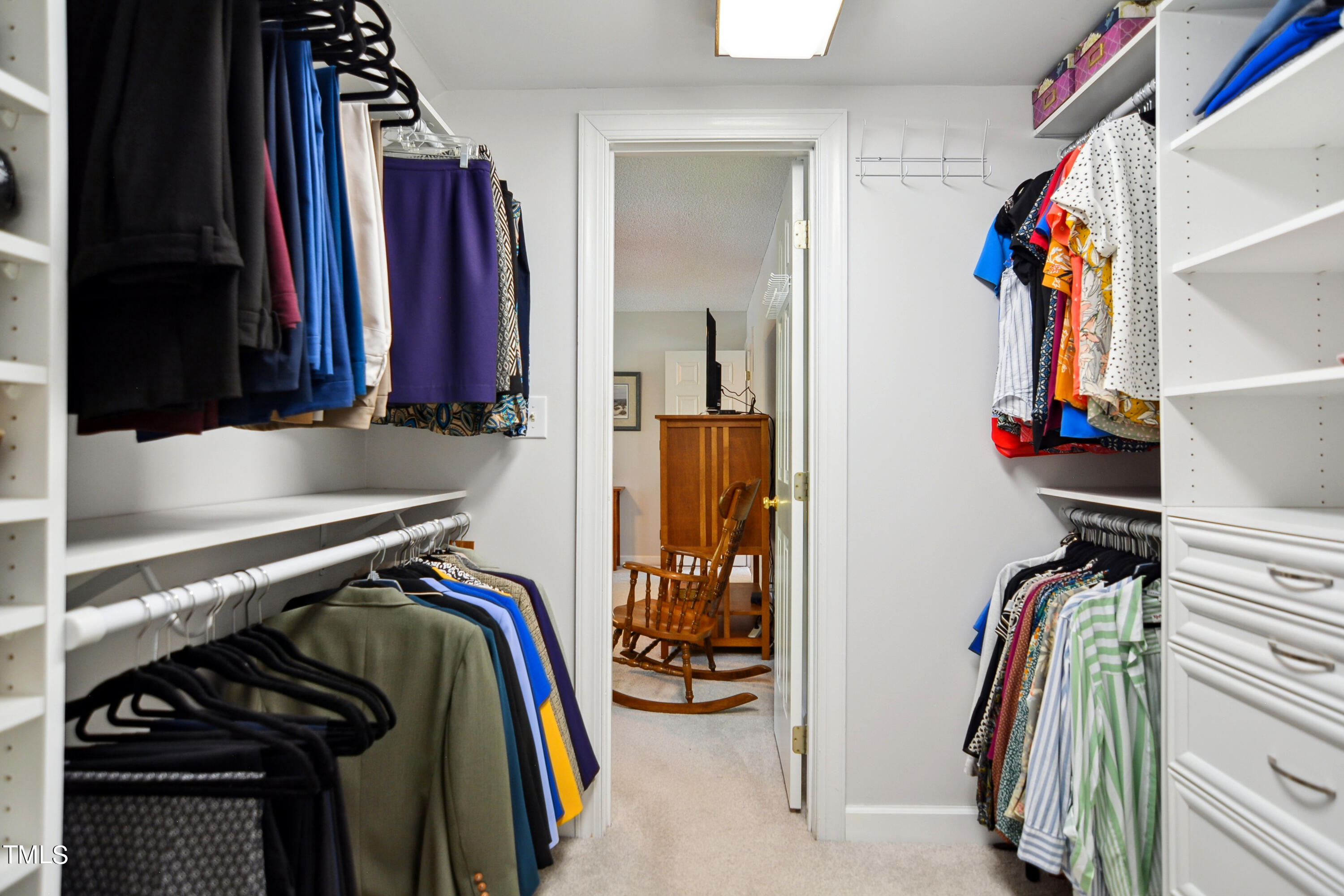 300 Foley Drive Garner, NC 27529 - Photo 15 of 29 a view of walk in closet with clothes and shoes