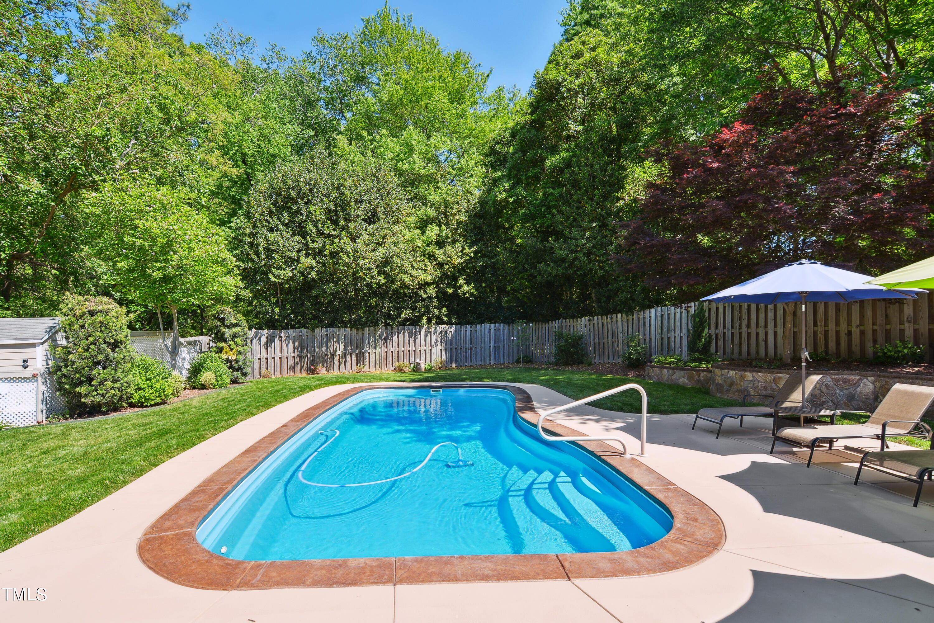 300 Foley Drive Garner, NC 27529 - Photo 25 of 29 a view of a swimming pool with a patio