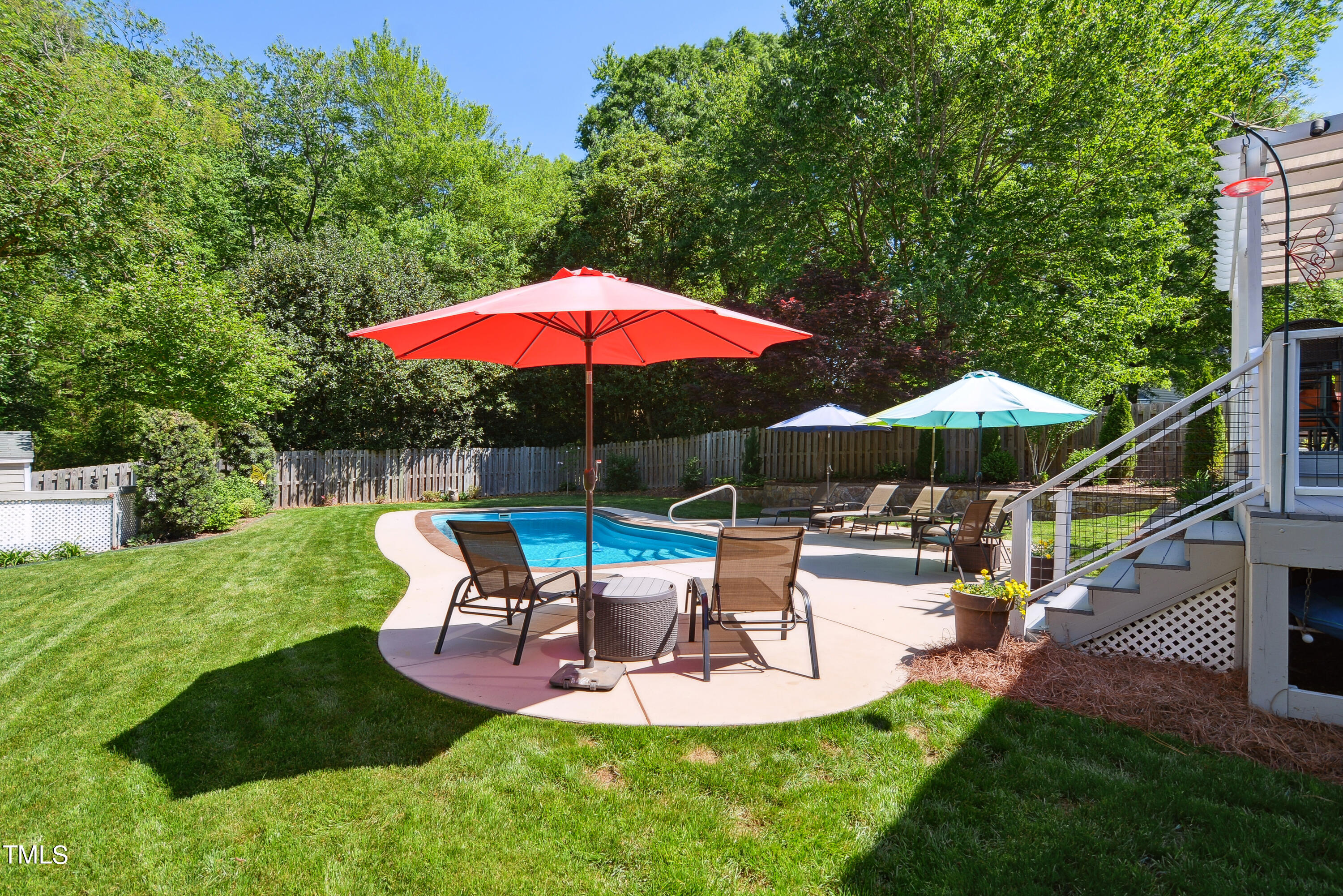 300 Foley Drive Garner, NC 27529 - Photo 26 of 29 a swimming pool with outdoor seating and yard