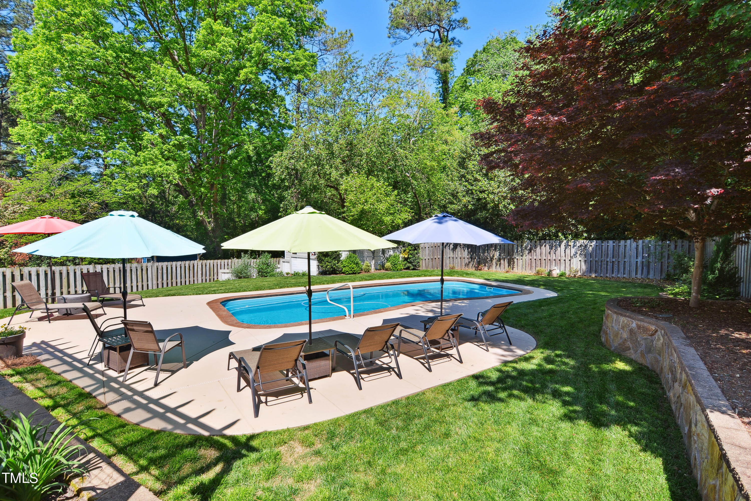300 Foley Drive Garner, NC 27529 - Photo 28 of 29 a view of an house with backyard and outdoor kitchen