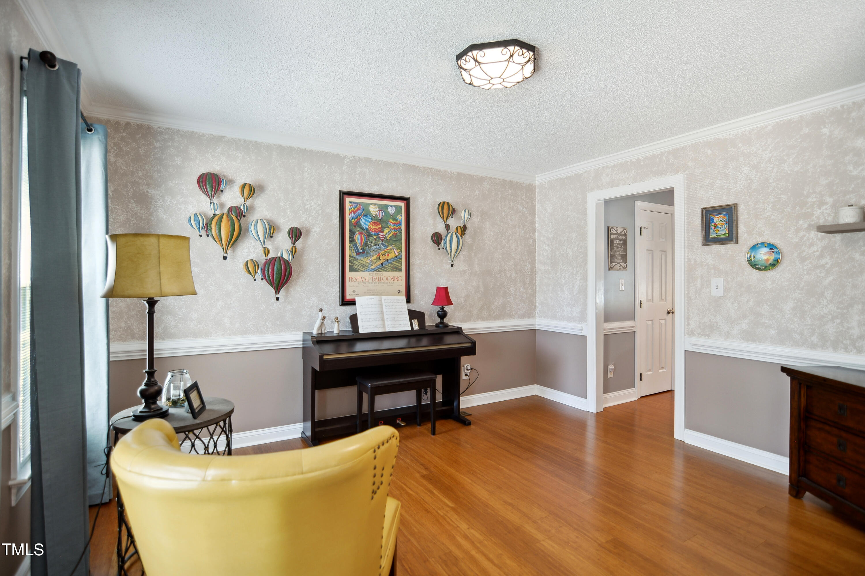 300 Foley Drive Garner, NC 27529 - Photo 6 of 29 a living room with furniture and a wooden floor
