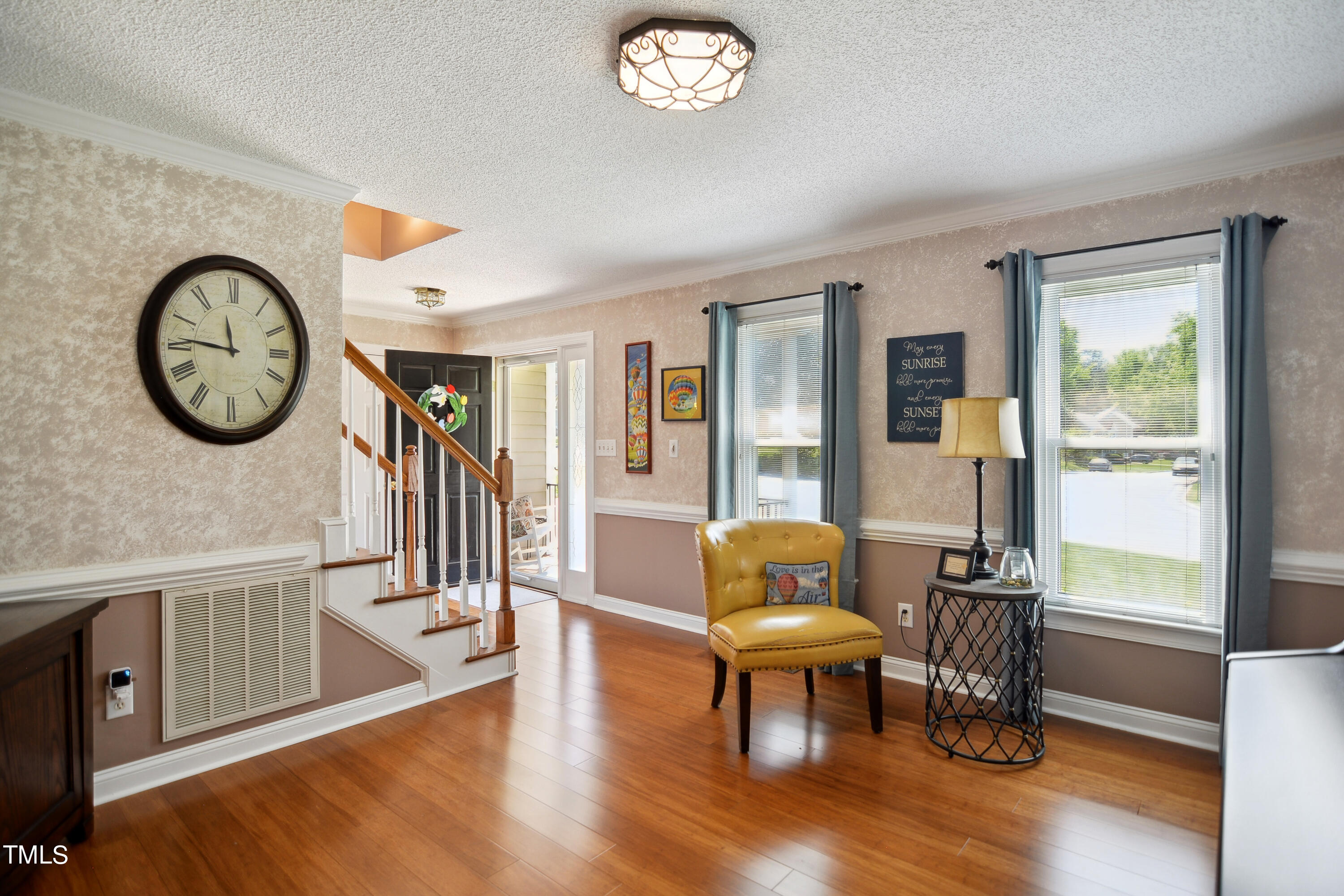 300 Foley Drive Garner, NC 27529 - Photo 7 of 29 a living room with furniture and a large window