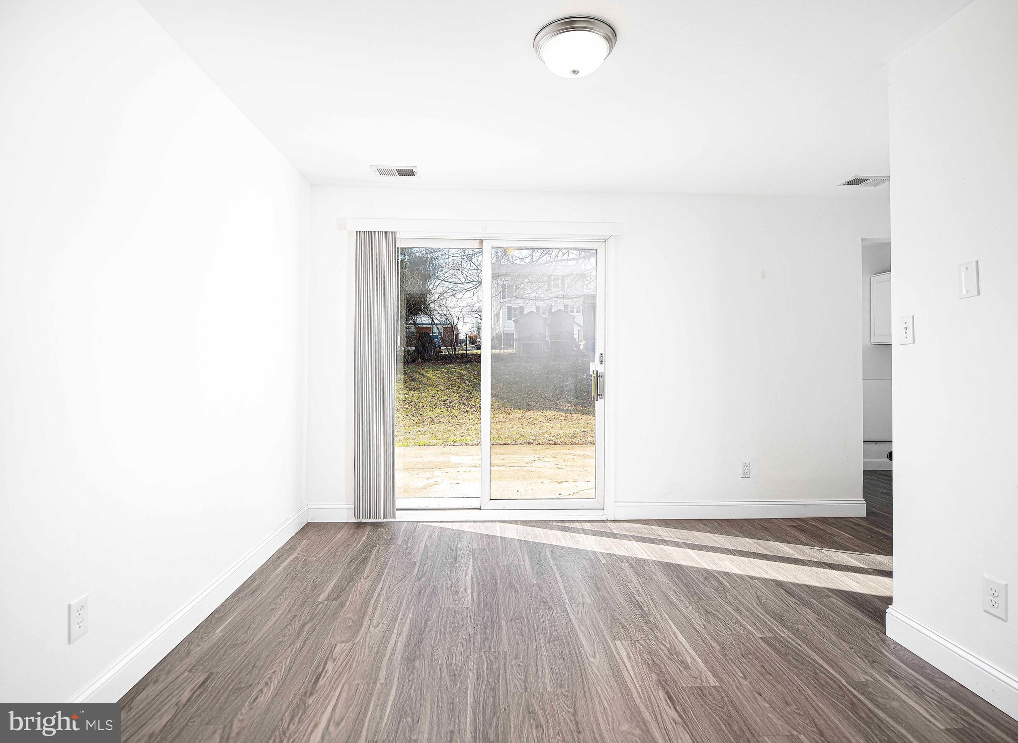 2 Louise Court Rising Sun, MD 21911 - Photo 6 of 29 DINING ROOM WITH SLIDING GLASS DOOR TO PATIO