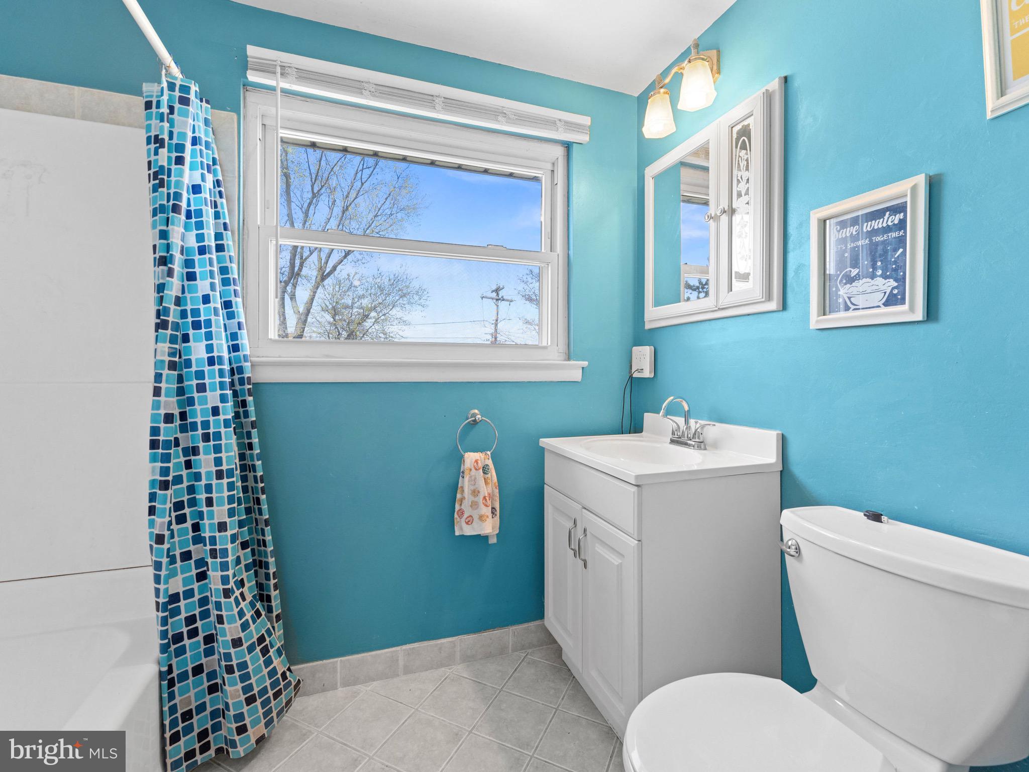 2685 Weir Road Aston, PA 19014 - Photo 20 of 27 a bathroom with a toilet and a sink