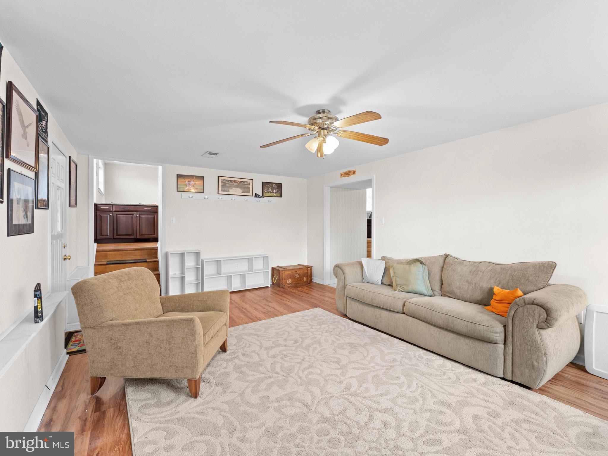 2685 Weir Road Aston, PA 19014 - Photo 9 of 27 a living room with furniture and a flat screen tv