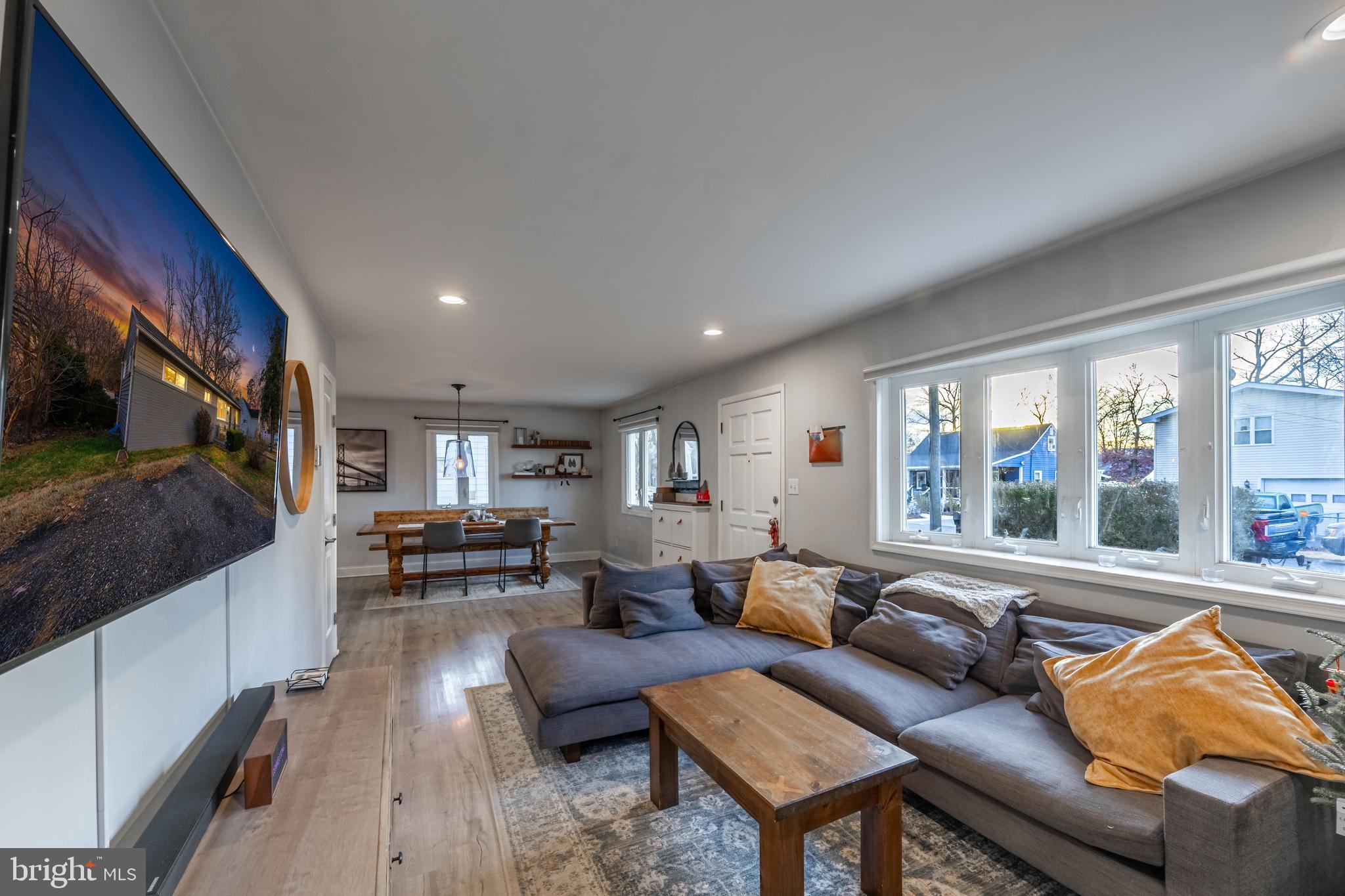 1001 Nancy Road Glen Burnie, MD 21061 - Photo 13 of 30 a living room with furniture and a flat screen tv
