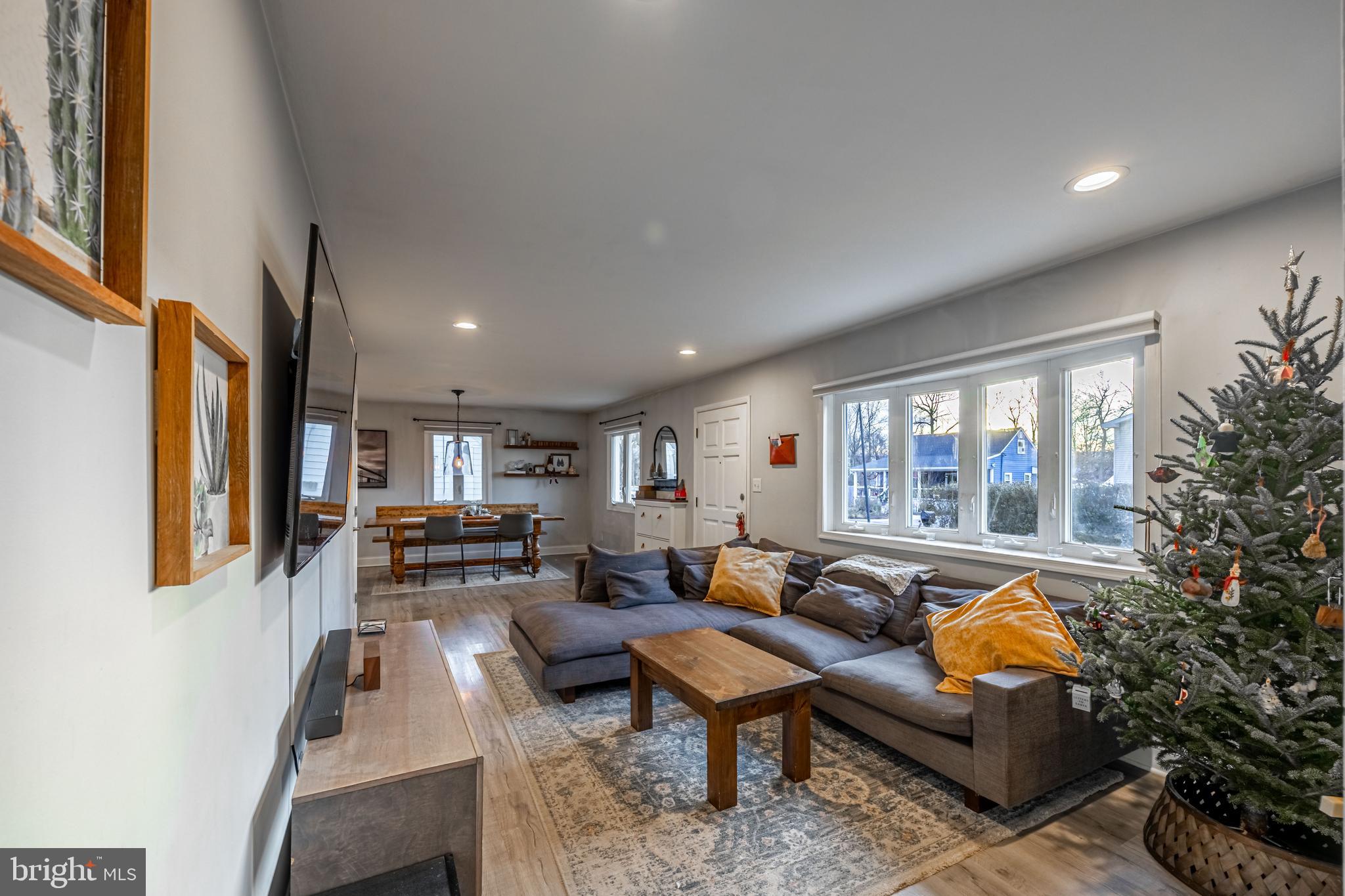 1001 Nancy Road Glen Burnie, MD 21061 - Photo 14 of 30 a living room with furniture fireplace and a large window