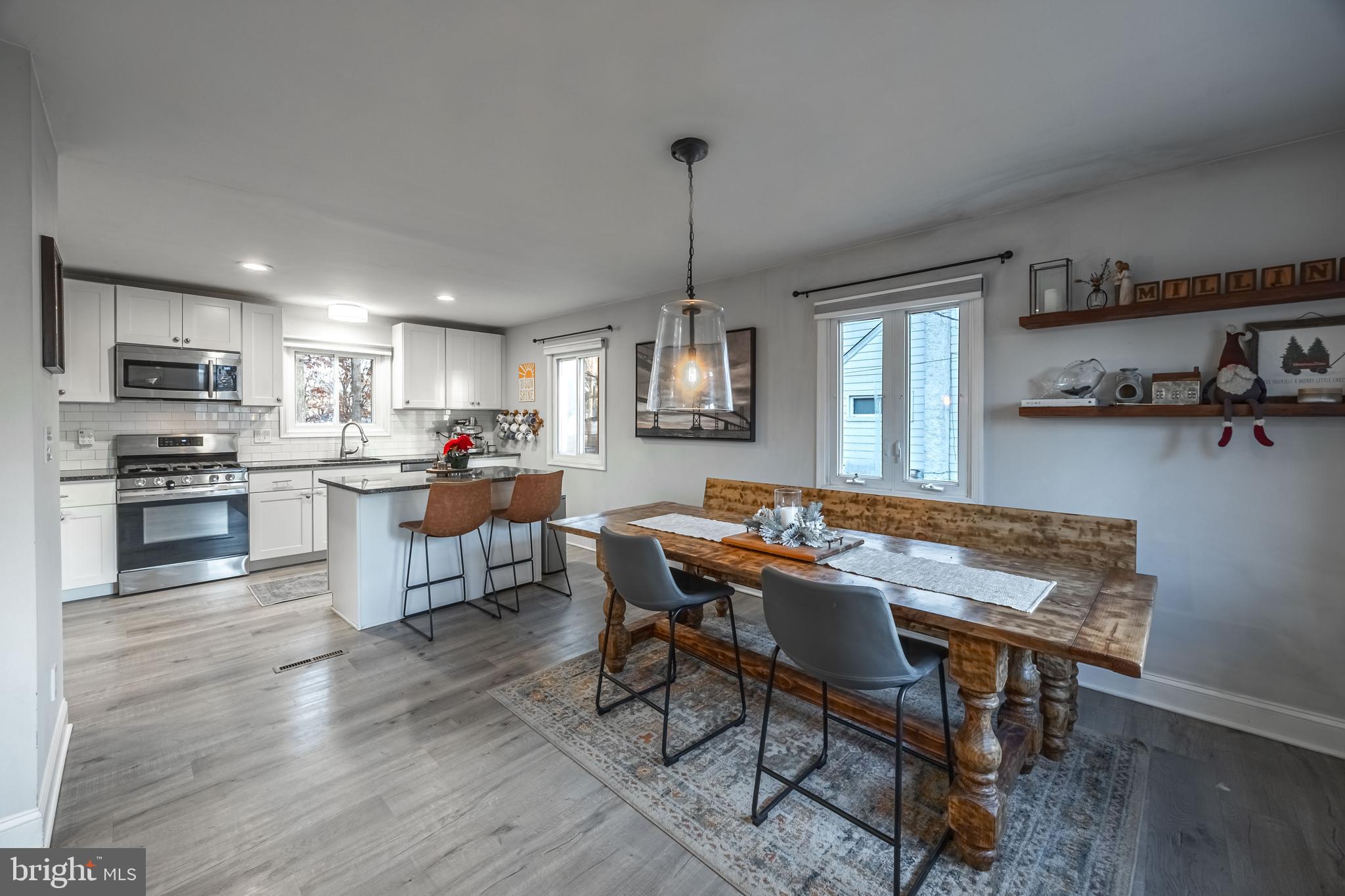 1001 Nancy Road Glen Burnie, MD 21061 - Photo 6 of 30 a view of a dining room with furniture window and wooden floor