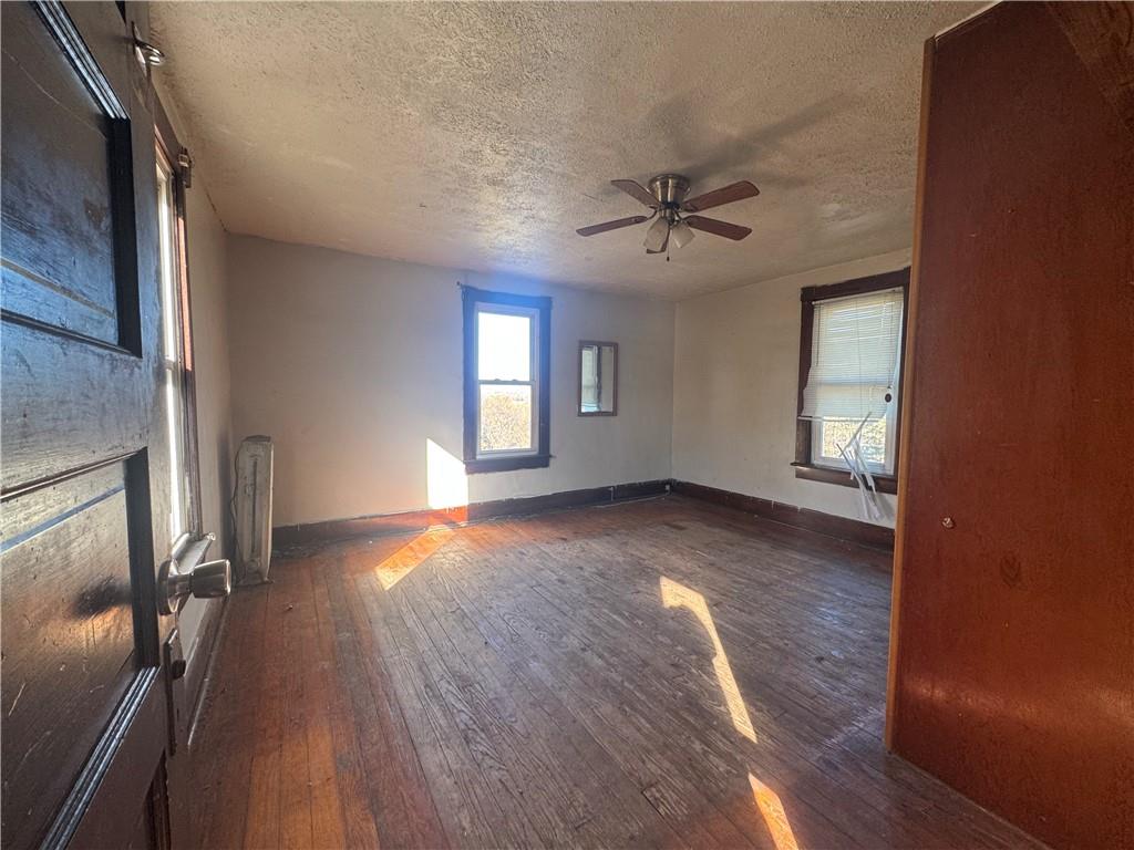 431 1st Street Allison, PA 15413 - Photo 12 of 15 a view of room window and wooden floor