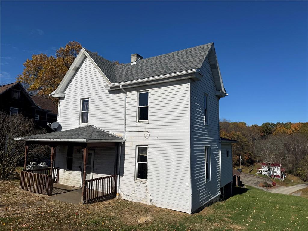 431 1st Street Allison, PA 15413 - Photo 2 of 15 a view of a house with a yard and furniture