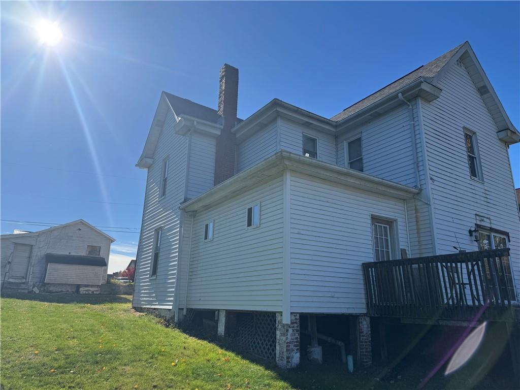431 1st Street Allison, PA 15413 - Photo 4 of 15 a front view of a house with garden