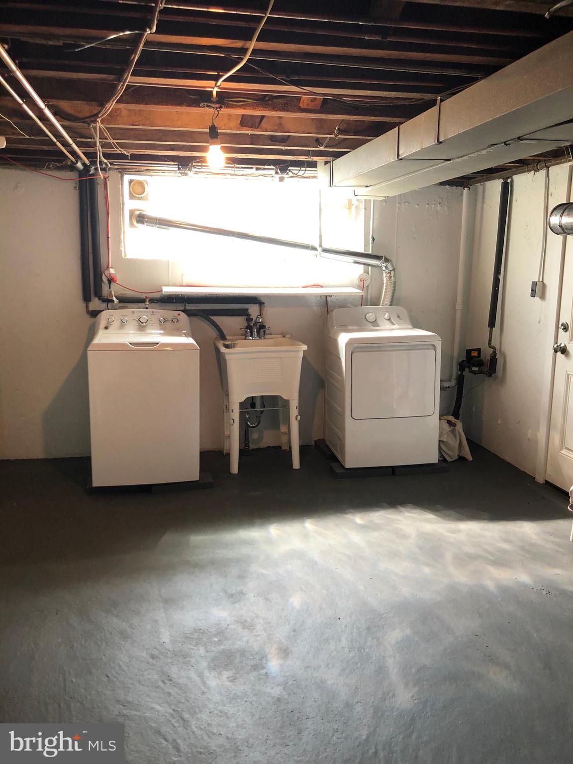 8726 Marsden Street Philadelphia, PA 19136 - Photo 22 of 24 a utility room with dryer and washer