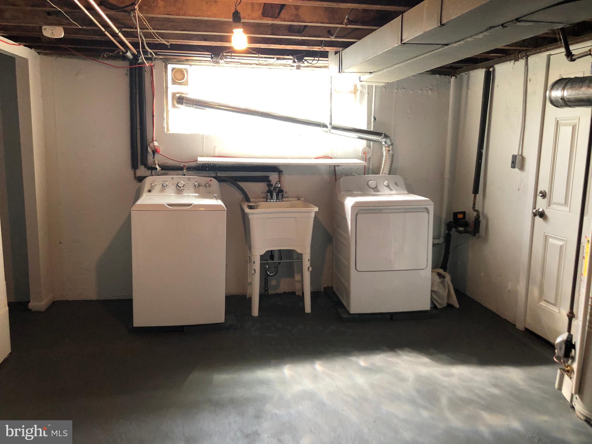 8726 Marsden Street Philadelphia, PA 19136 - Photo 23 of 24 a utility room with dryer and washer