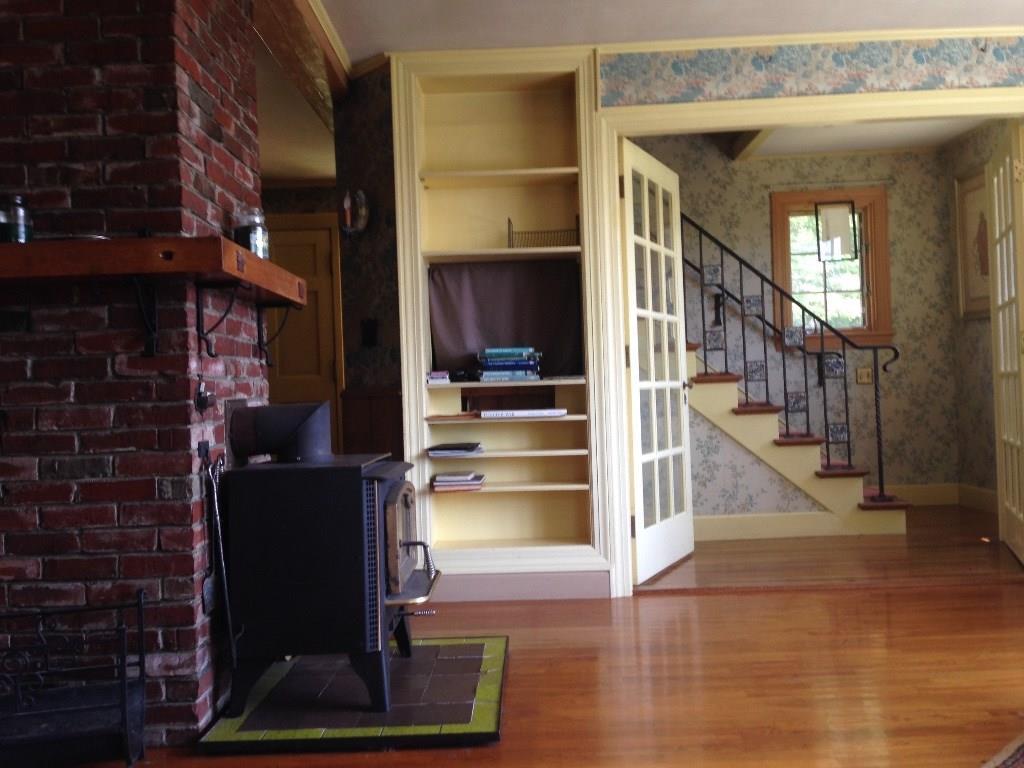 98 Reach Road Brooklin, ME 04616 - Photo 9 of 23 French doors open on to hallway with...