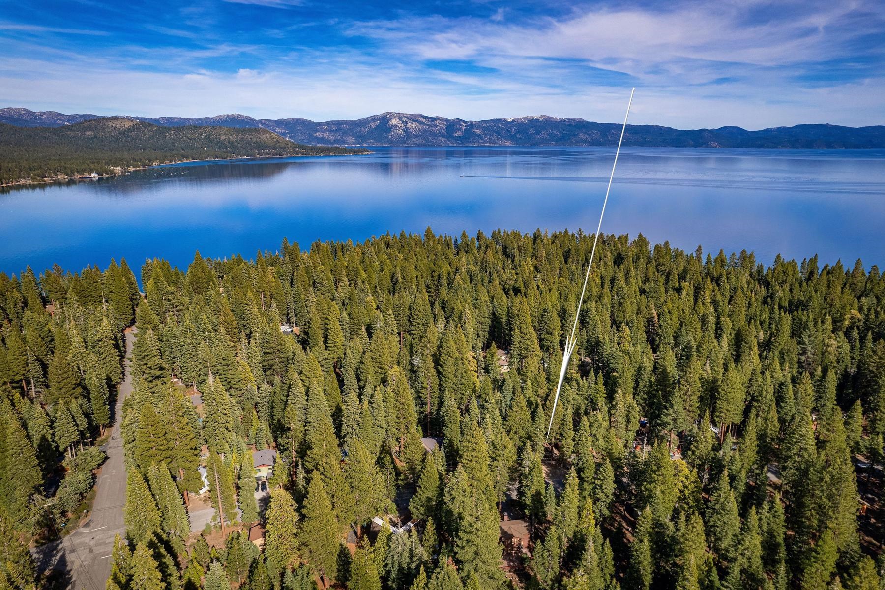 5656 Victoria Road Carnelian Bay, CA 96140 - Photo 2 of 28 a view of lake with mountain