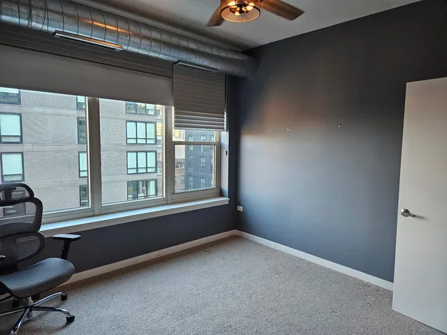 a room with furniture and windows