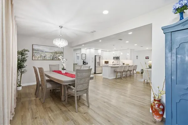 a view of room with furniture and wooden floor