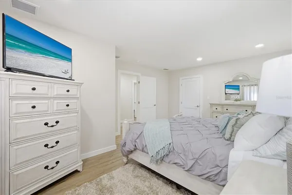 a bathroom with a sink toilet and vanity