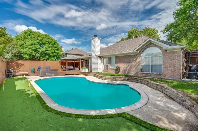 a view of outdoor space yard swimming pool and porch