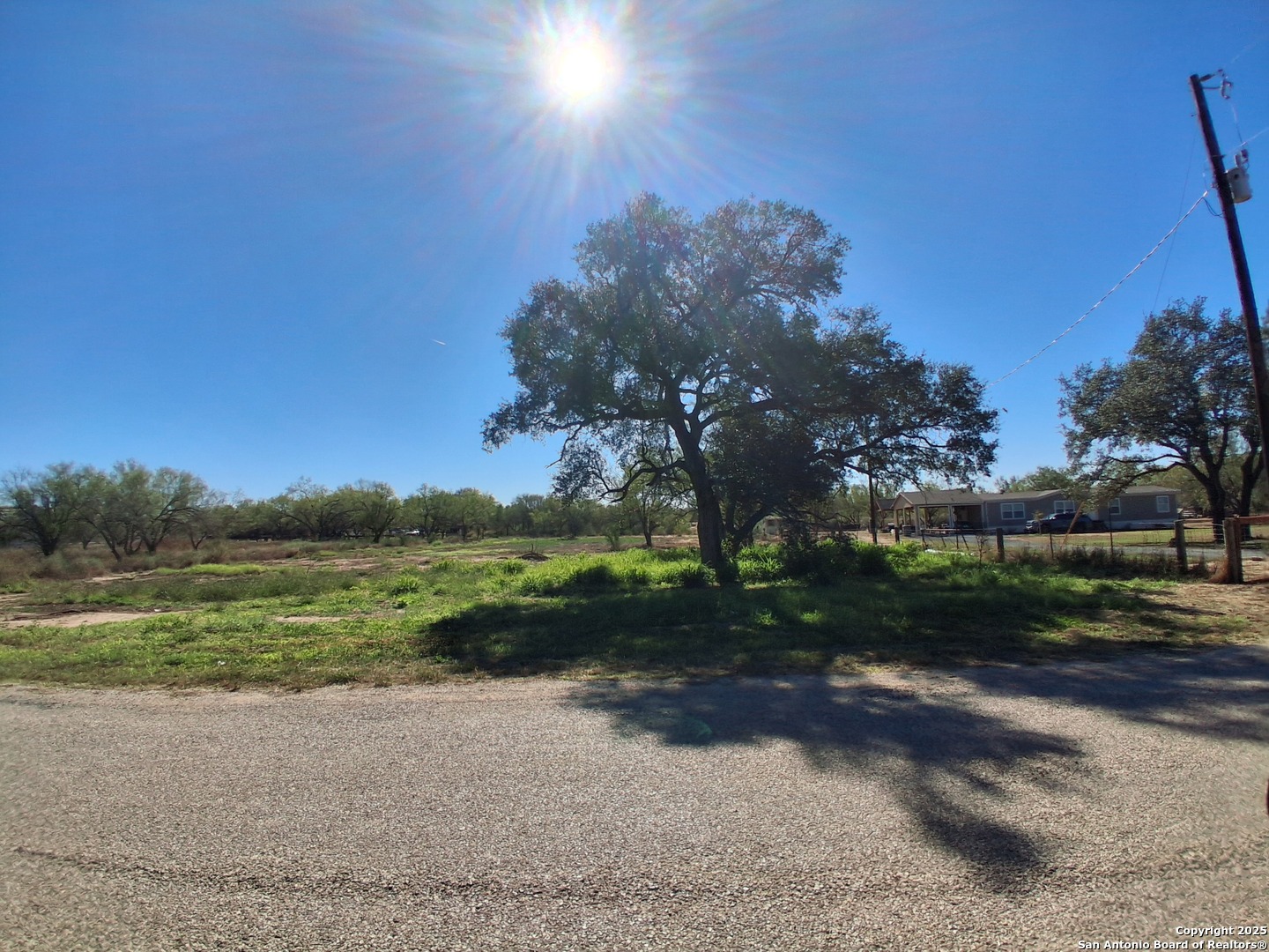105 County Road 2671 Devine, TX 78016 - Photo 2 of 6 a view of a park with large trees