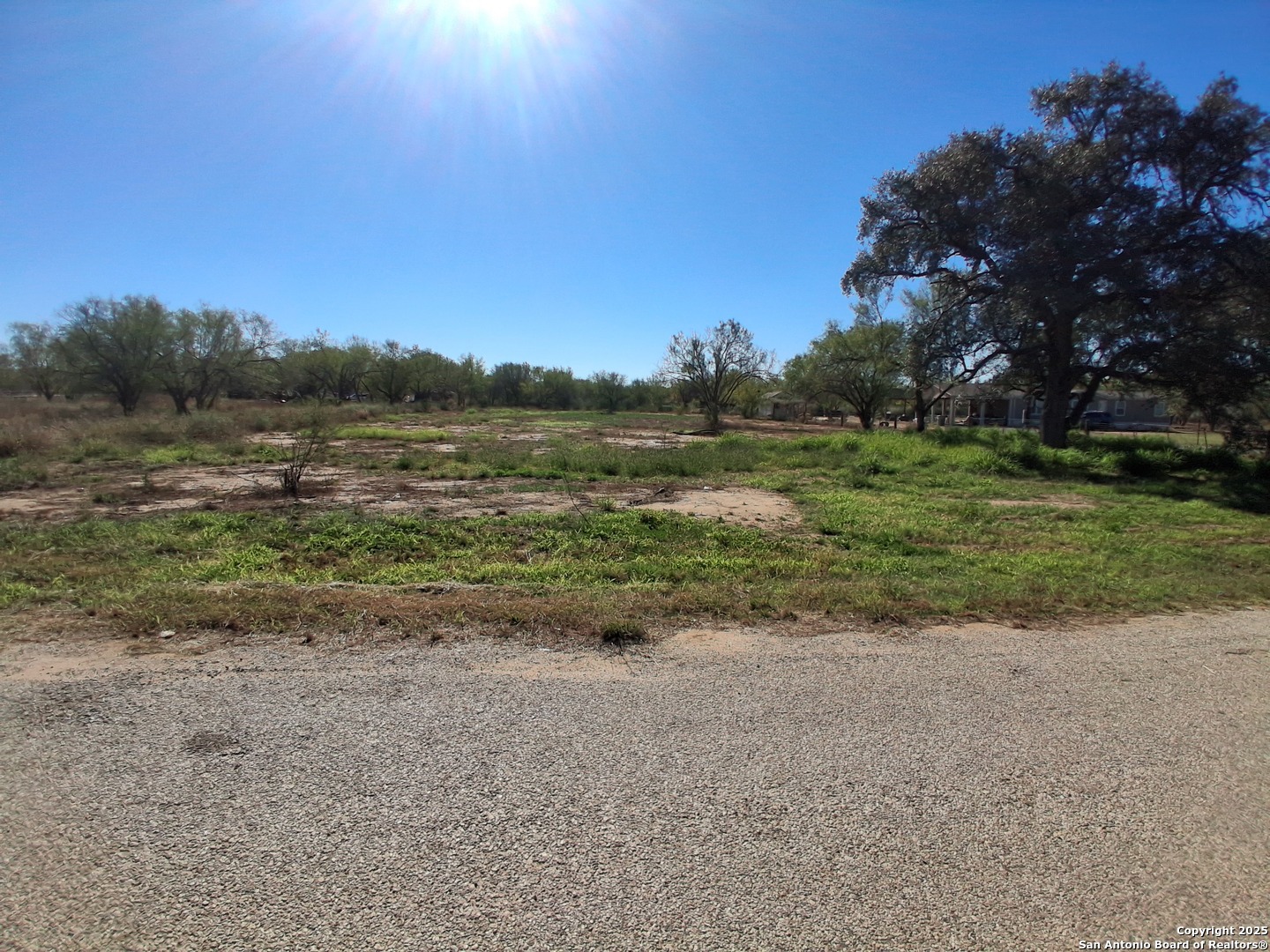 105 County Road 2671 Devine, TX 78016 - Photo 6 of 6 a view of a lake with outdoor space