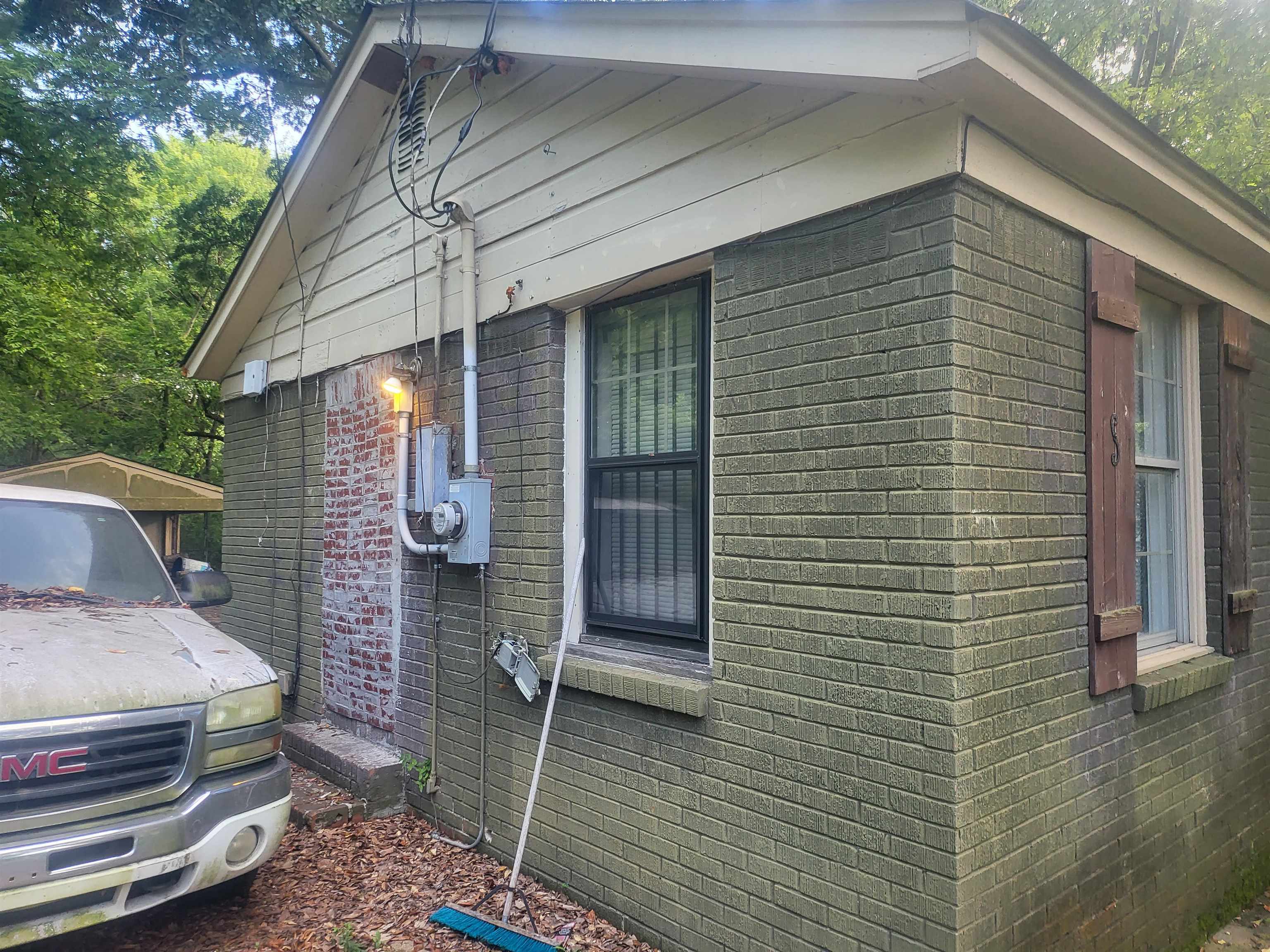 655 Granada Road Memphis, TN 38109 - Photo 5 of 5 a front view of a house with barbeque