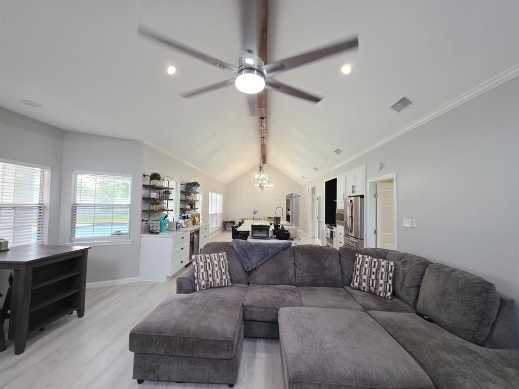 520 Red River Road Belton, TX 76513 - Photo 26 of 36 Vaulted ceiling with exposed wood beam and recessed lighting