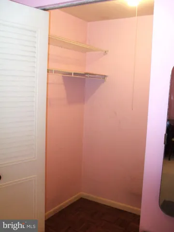 a view of small space with racks on the wall