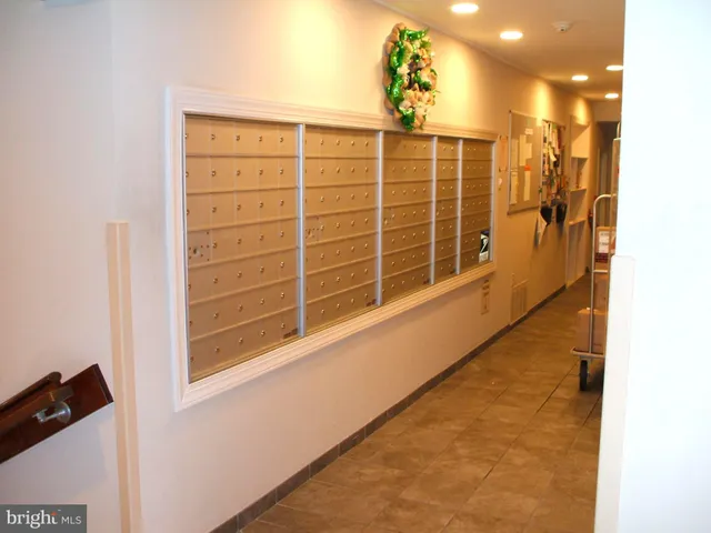 a bookshelf with wooden floor