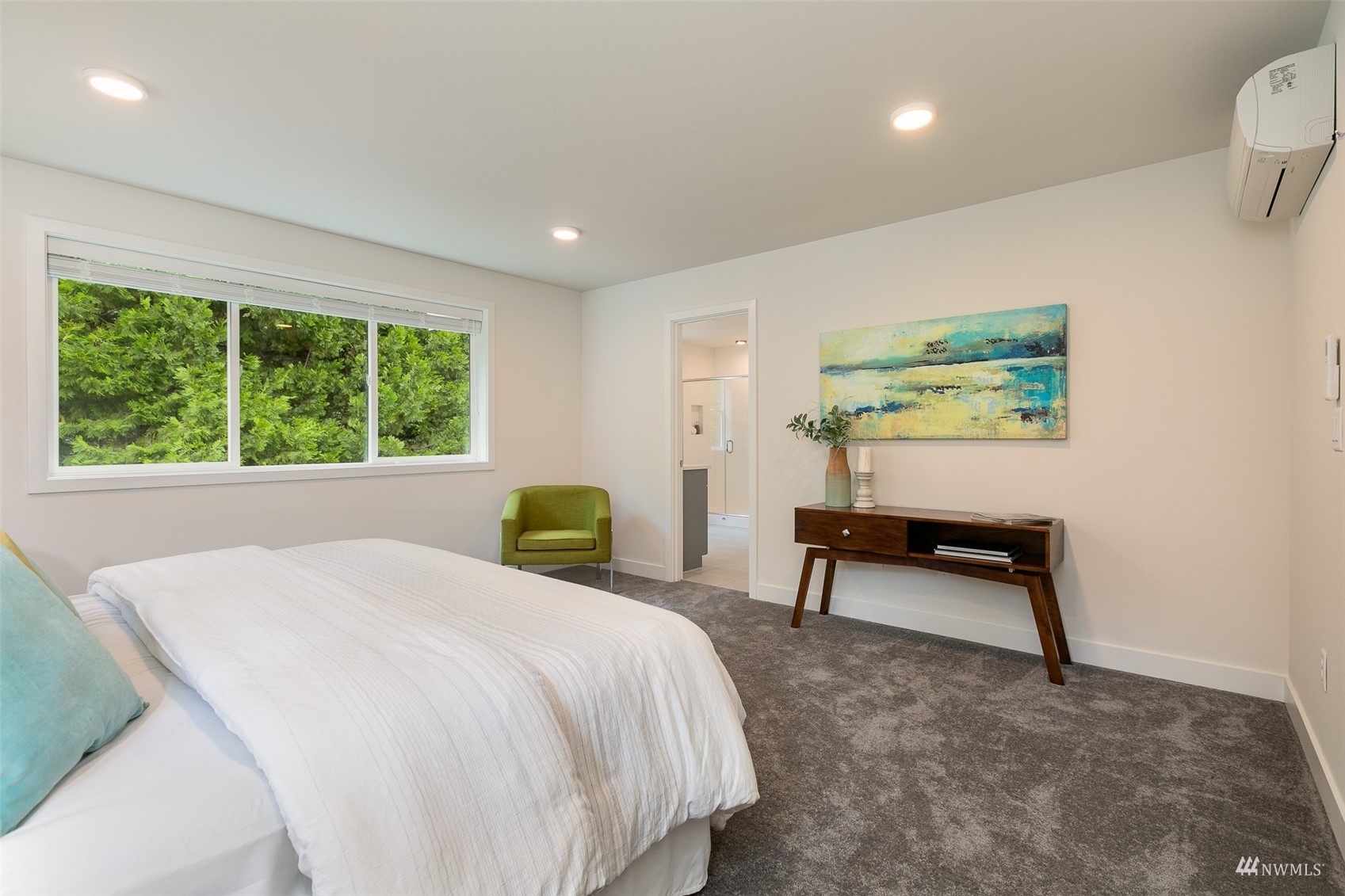 117 171st Place Southwest, Unit A Bothell, WA 98012 - Photo 14 of 20 a bedroom with a bed and a dresser