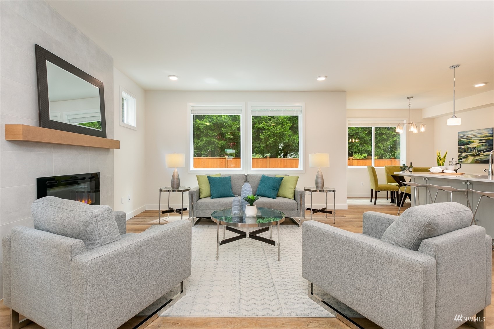 117 171st Place Southwest, Unit A Bothell, WA 98012 - Photo 3 of 20 a living room with furniture and a fireplace