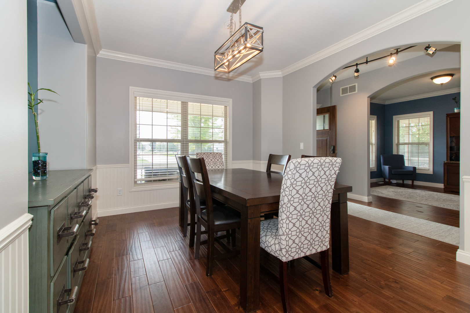 4002 Rockledge Road Bloomington, IL 61705 - Photo 11 of 60 a view of a a dining room with furniture window and wooden floor
