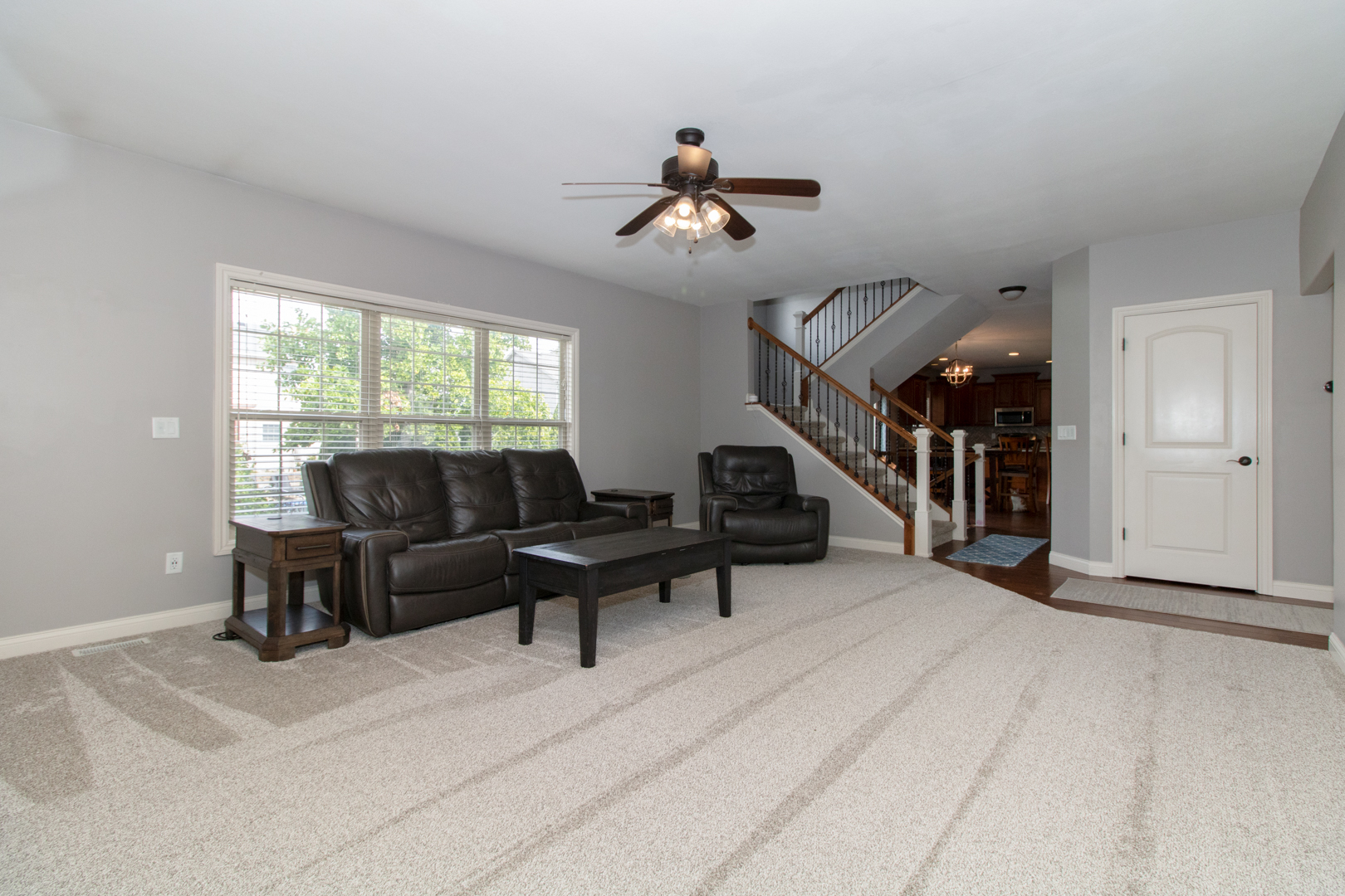 4002 Rockledge Road Bloomington, IL 61705 - Photo 14 of 60 a living room with furniture and a window