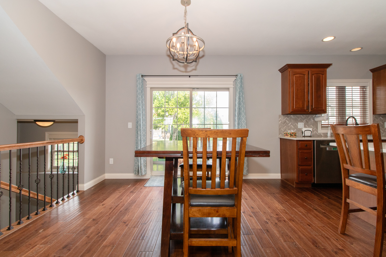 4002 Rockledge Road Bloomington, IL 61705 - Photo 25 of 60 a view of a dining room with furniture window and wooden floor
