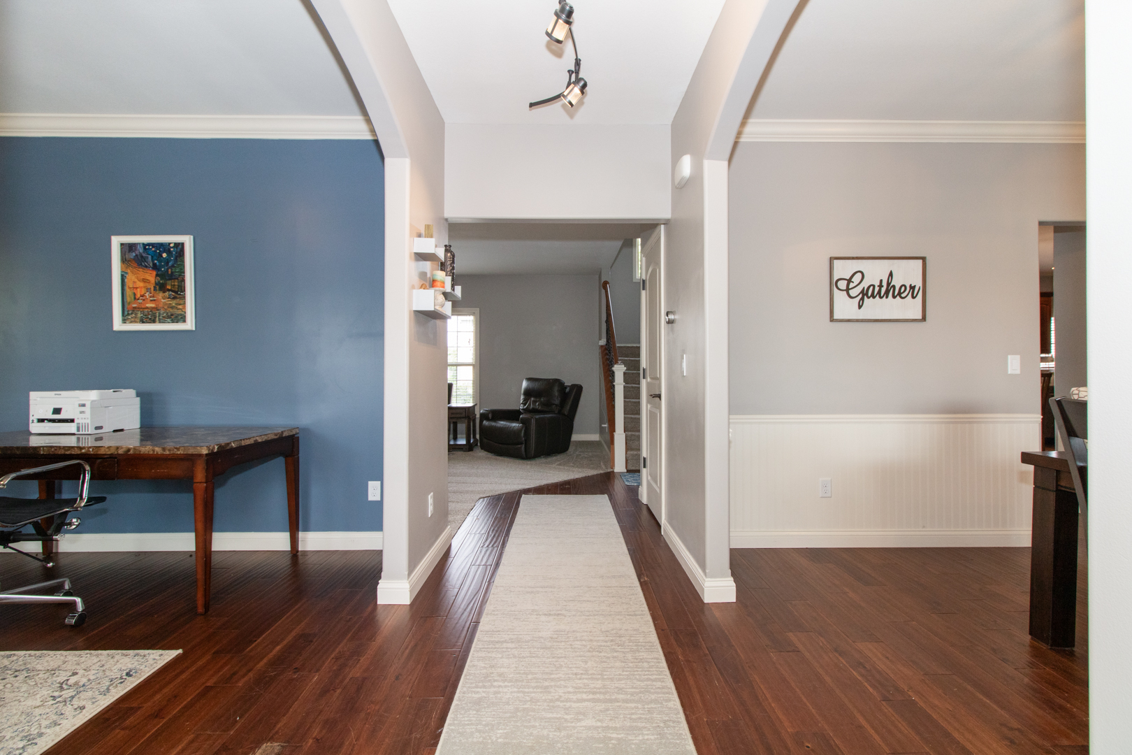 4002 Rockledge Road Bloomington, IL 61705 - Photo 3 of 60 a view of a hallway with a livingroom and furniture
