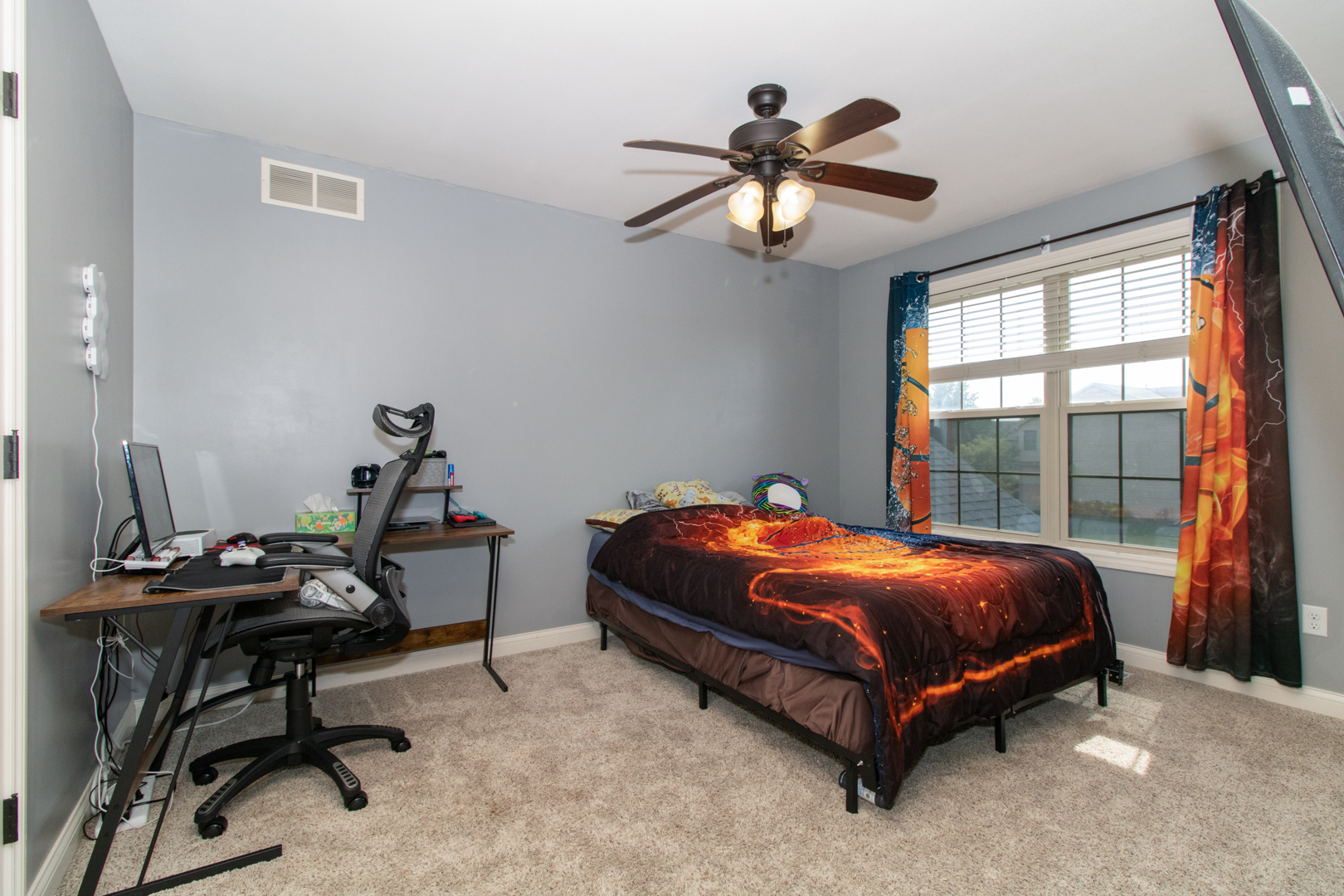 4002 Rockledge Road Bloomington, IL 61705 - Photo 41 of 60 a bed room with a bed and a window