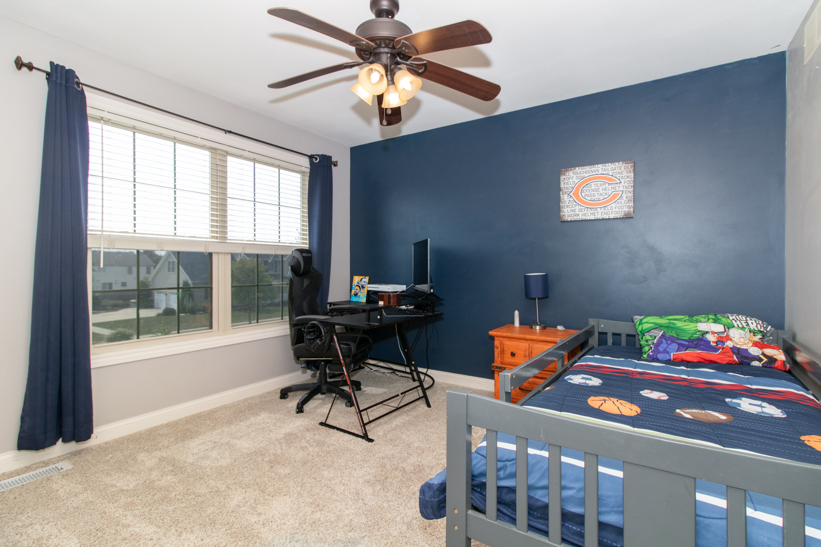 4002 Rockledge Road Bloomington, IL 61705 - Photo 44 of 60 a bedroom with furniture and a window