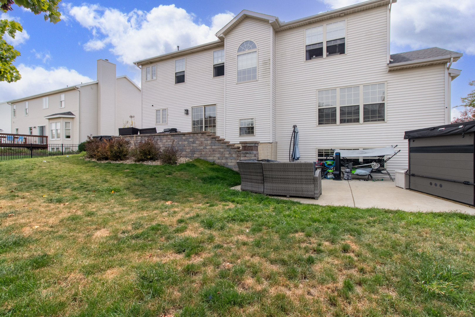 4002 Rockledge Road Bloomington, IL 61705 - Photo 59 of 60 a view of a house with a back yard