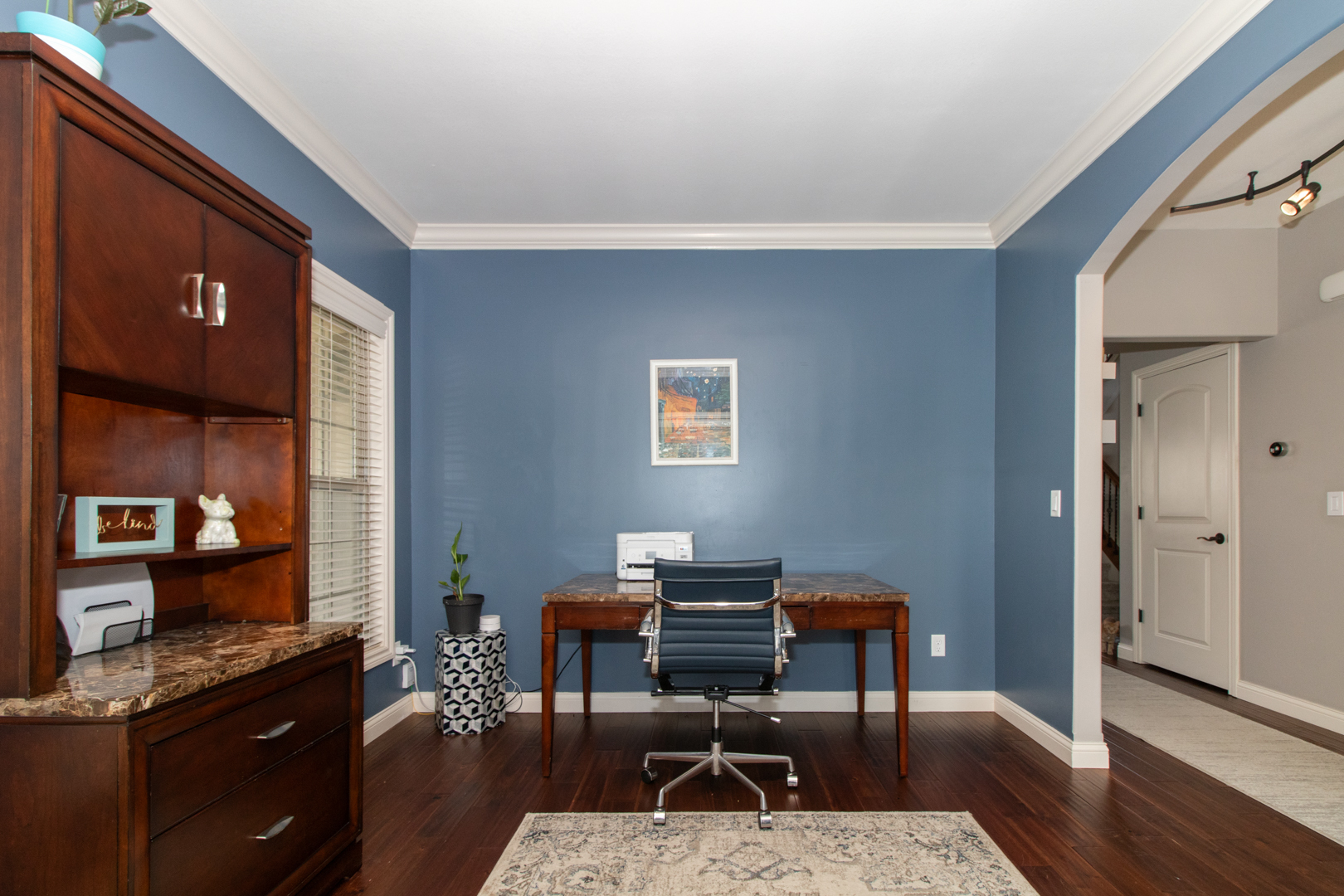 4002 Rockledge Road Bloomington, IL 61705 - Photo 6 of 60 a work room with furniture and wooden floor