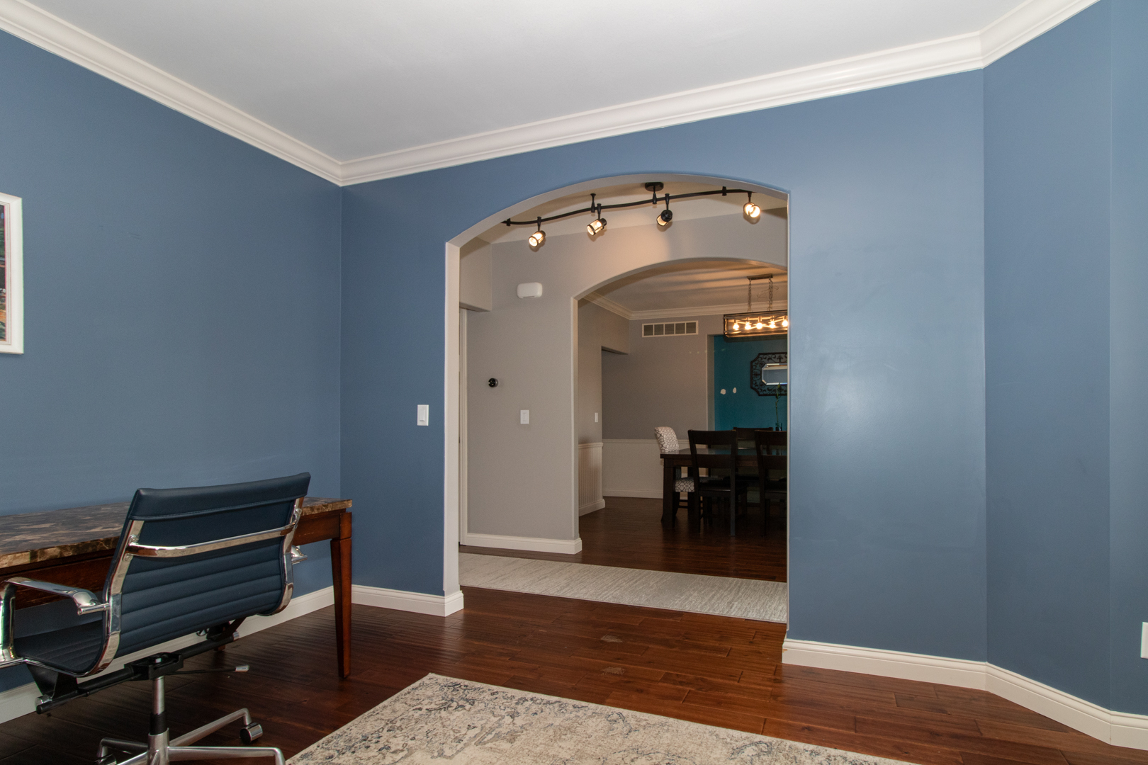 4002 Rockledge Road Bloomington, IL 61705 - Photo 7 of 60 a view of a hallway with wooden floor and a entryway