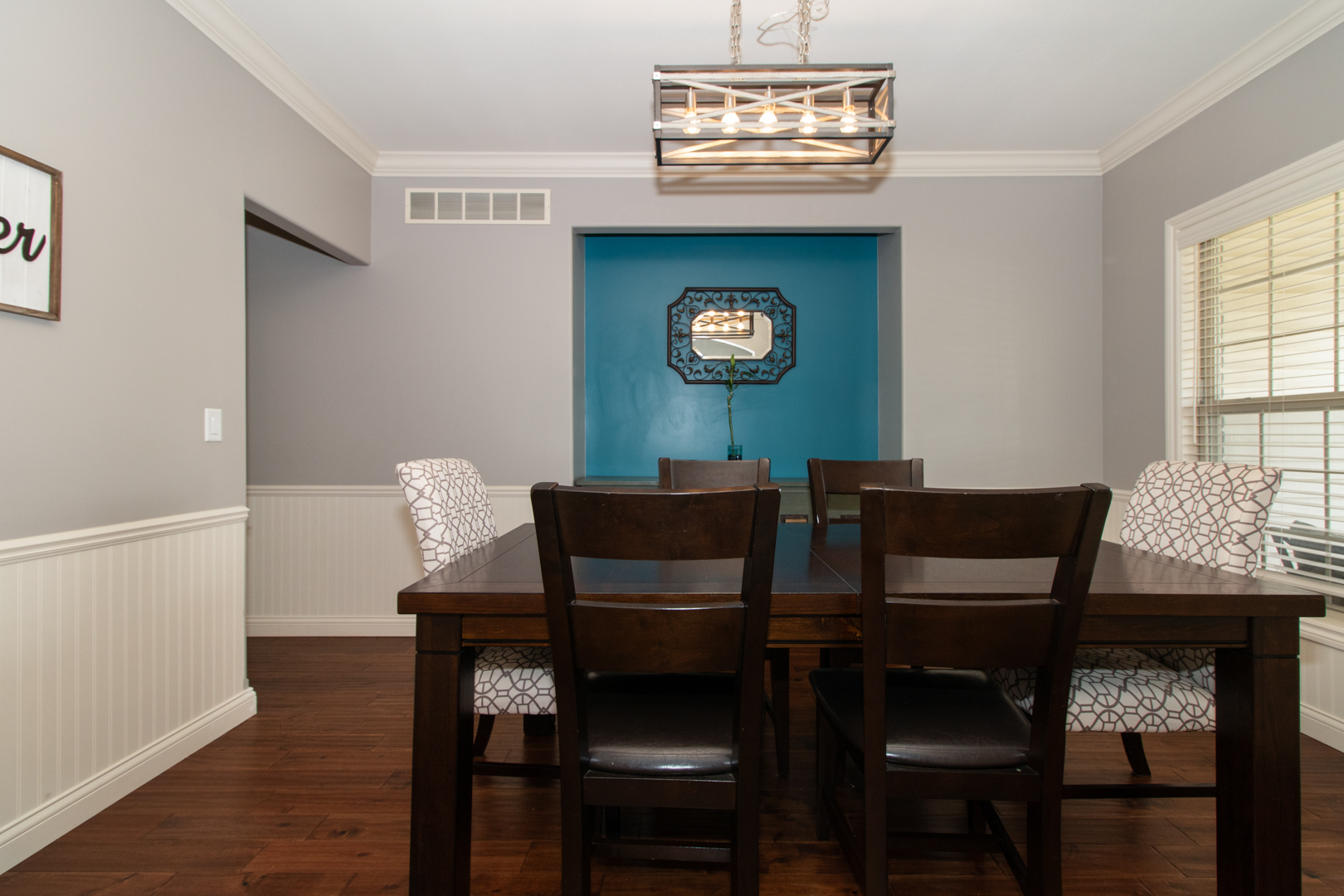 4002 Rockledge Road Bloomington, IL 61705 - Photo 8 of 60 a view of a dining room with furniture and wooden floor