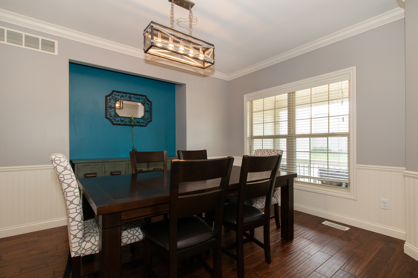 4002 Rockledge Road Bloomington, IL 61705 - Photo 9 of 60 a view of a dining room with a table and chairs
