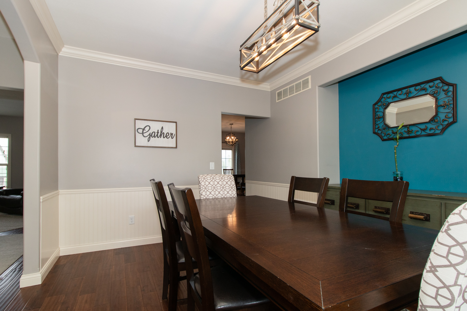 4002 Rockledge Road Bloomington, IL 61705 - Photo 10 of 60 a view of a dining room with furniture and wooden floor