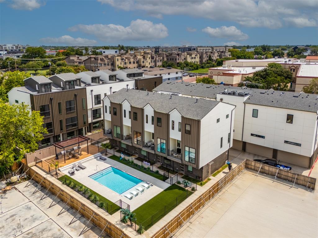 4517 Munger Avenue, Unit 101 Dallas, TX 75204 - Photo 6 of 39 a view of a city with tall buildings