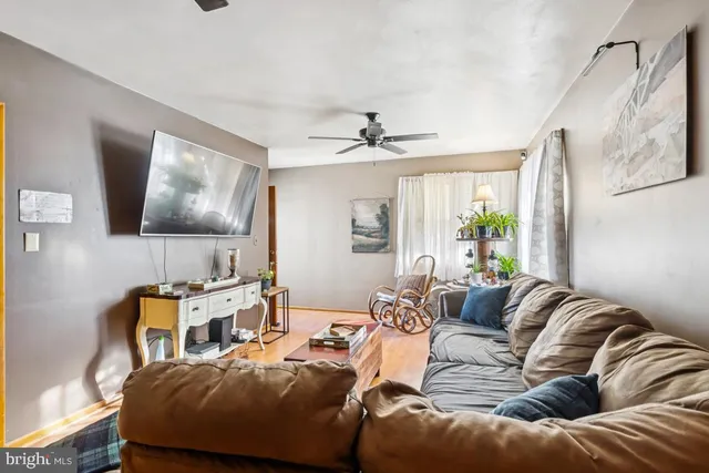a bathroom with a sink a vanity and a shower