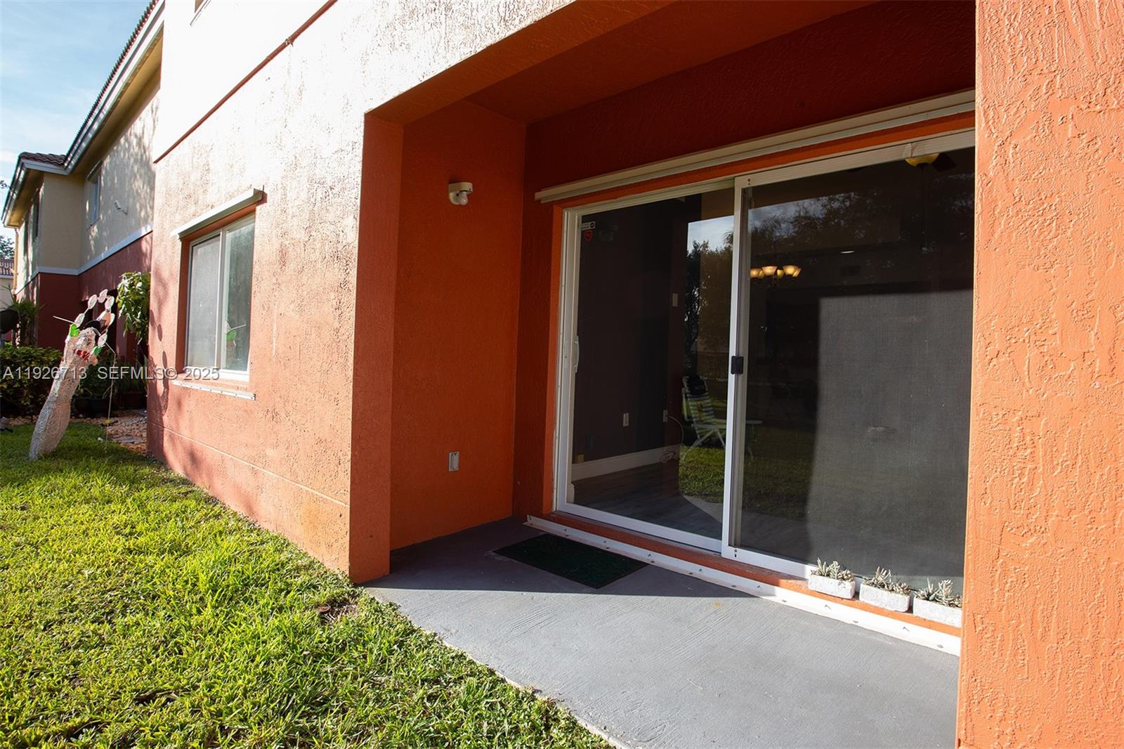 3340 Palomino Drive, Unit 2112 Davie, FL 33024 - Photo 19 of 25 a view of a door and outdoor space
