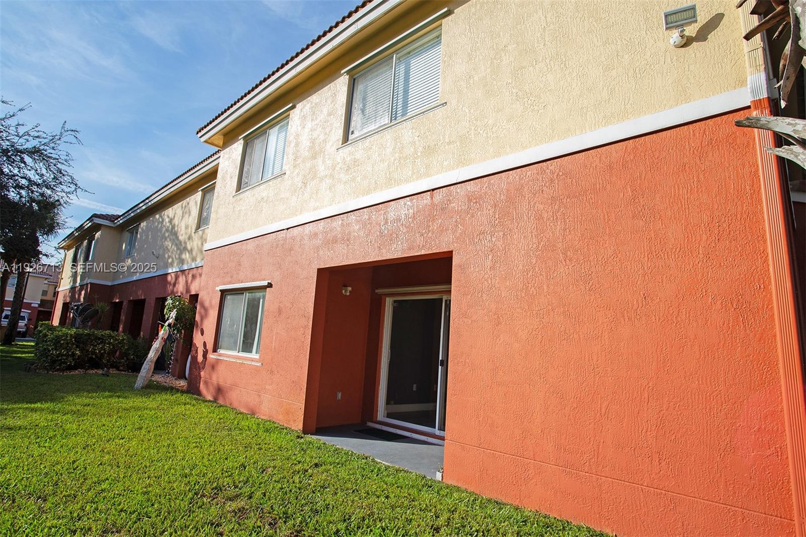 3340 Palomino Drive, Unit 2112 Davie, FL 33024 - Photo 20 of 25 a view of house with backyard and garden